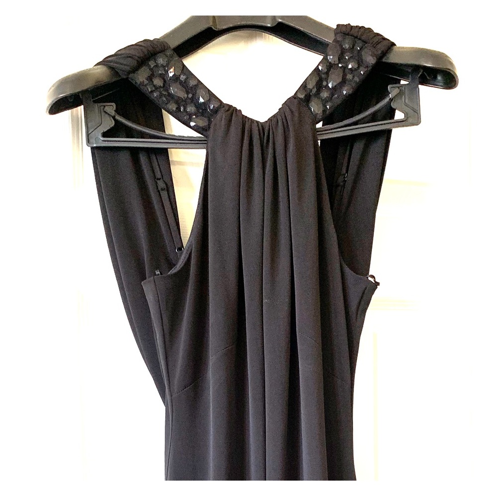 Black cocktail dress with dramatic back